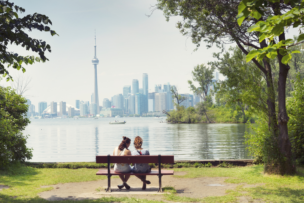 two women with a view of Toronto