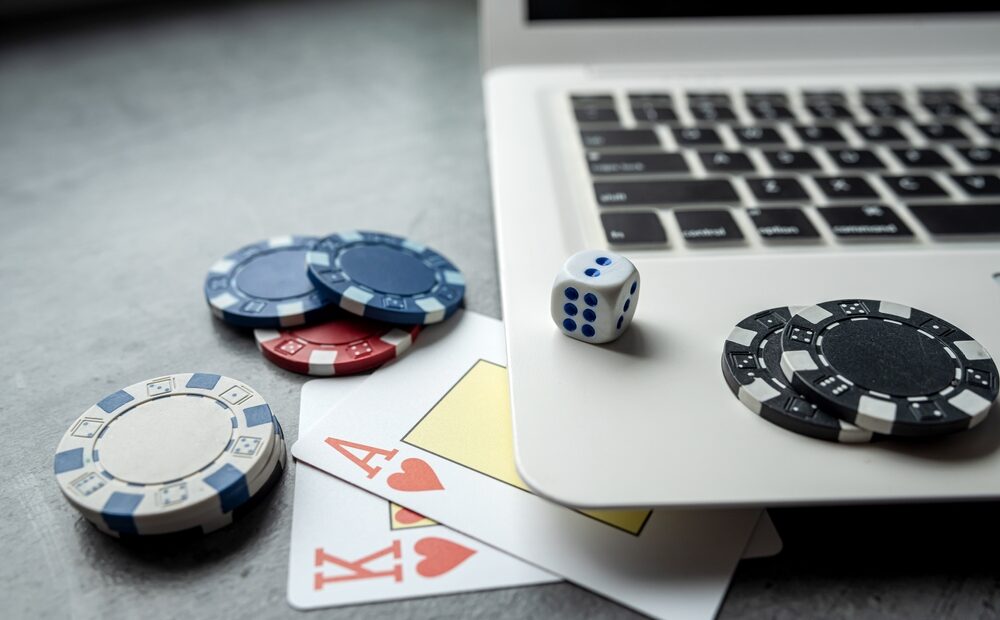 Casino chips by laptop