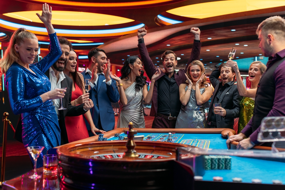 People celebrate a win in a casino VIP room