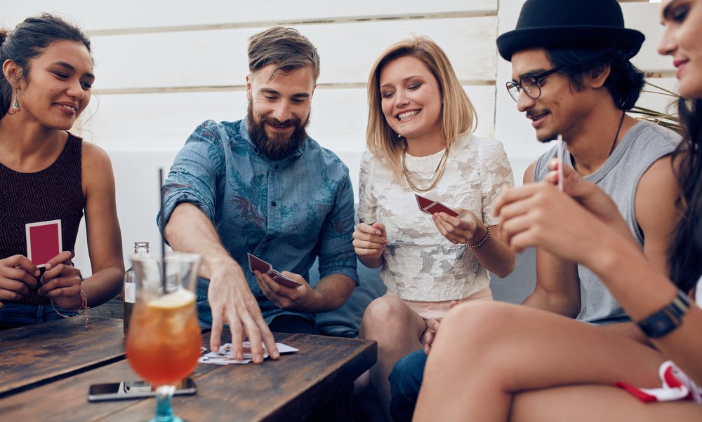 friends playing cards