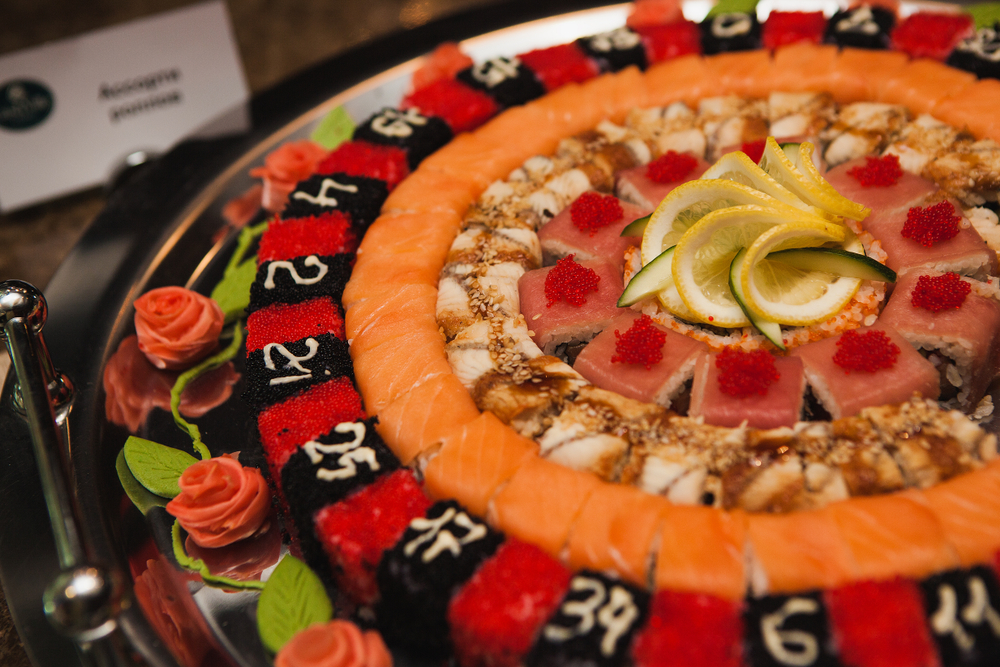 Sushi arranged into a decorative roulette wheel