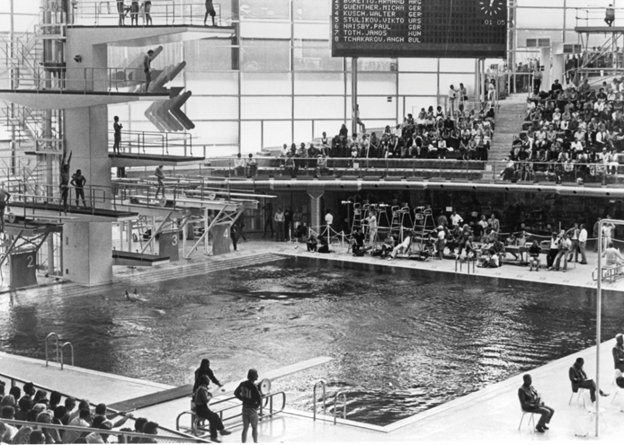 A swimming event scene from "Visions of Eight"