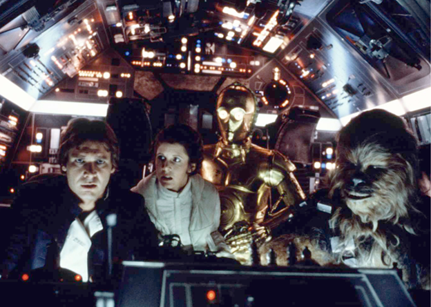 Harrison Ford and Carrie Fisher with Chewbacca and C-3PO in "Star Wars: Episode V - The Empire Strikes Back"